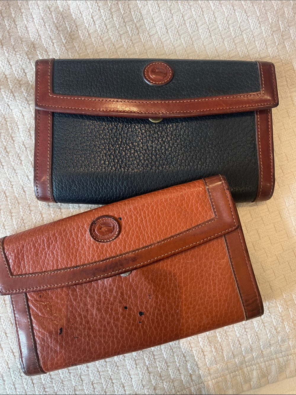 Dooney & Bourke Black and Brown Pebbled Leather Continental Wallets
